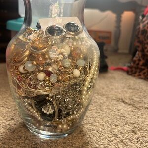 Assorted Jewelry in Glass Vase